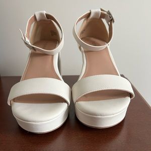 Torrid white platform heels. Size 7